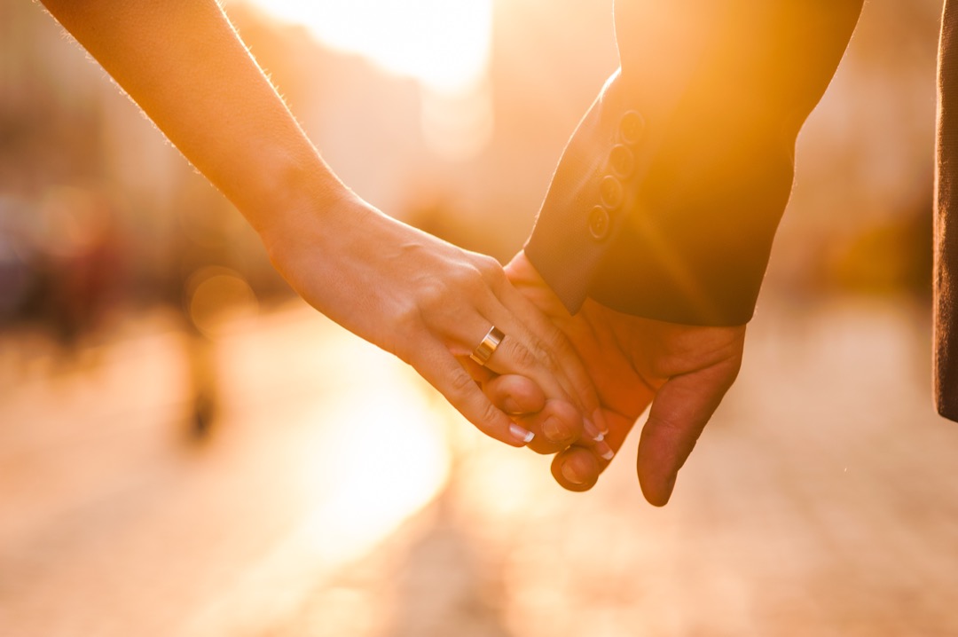 Beautiful couple holding